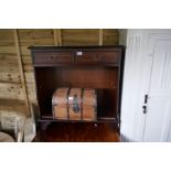 Sundry furniture to include mahogany two door cupboard, bookcase, coffee table, tea trolley, iron bo