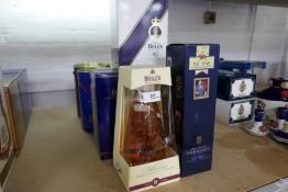 A bottle of Bells millennium 2000 whisky a commemorative bottle for V-E Day premiers, and a 7 Bells