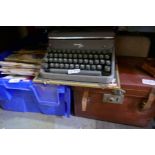 Box of ephemera, typewriter, etc