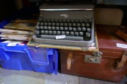 Box of ephemera, typewriter, etc