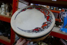 A Bodhran, with beater