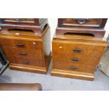 A pair of Art Deco style three drawer bedside chests