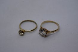 9ct yellow gold dress ring with a clear stone, marked 375, 2.8g approx, size O, and another similar