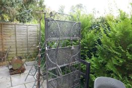 Metal three fold garden screen decorated butterflies and wrought iron stand