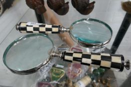 2 x magnifying glasses