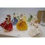 Seven Royal Doulton figures and one similar Coalport example