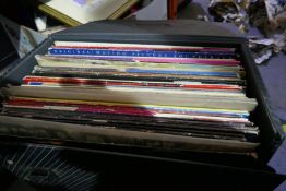 Box of mixed LPs including The Beatles Album, Queen, Genesis, etc