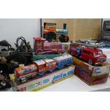 A selection of tinplate toys including Fire Engine etc, with boxes, stamped Made in China