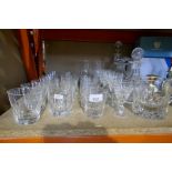 A selection of lead crystal mostly consisting of water jugs, decanters, etc