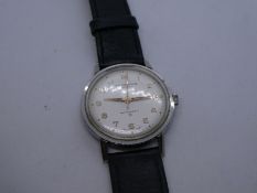 Vintage gents stainless steel 'JW Benson' wristwatch on black leather strap - inscribed 'CRCURTIS 19