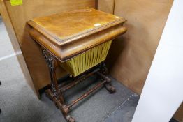 A Victorian Burr Walnut sewing table with rising lid and pierced shaped supports 51cm