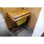 A Victorian Burr Walnut sewing table with rising lid and pierced shaped supports 51cm