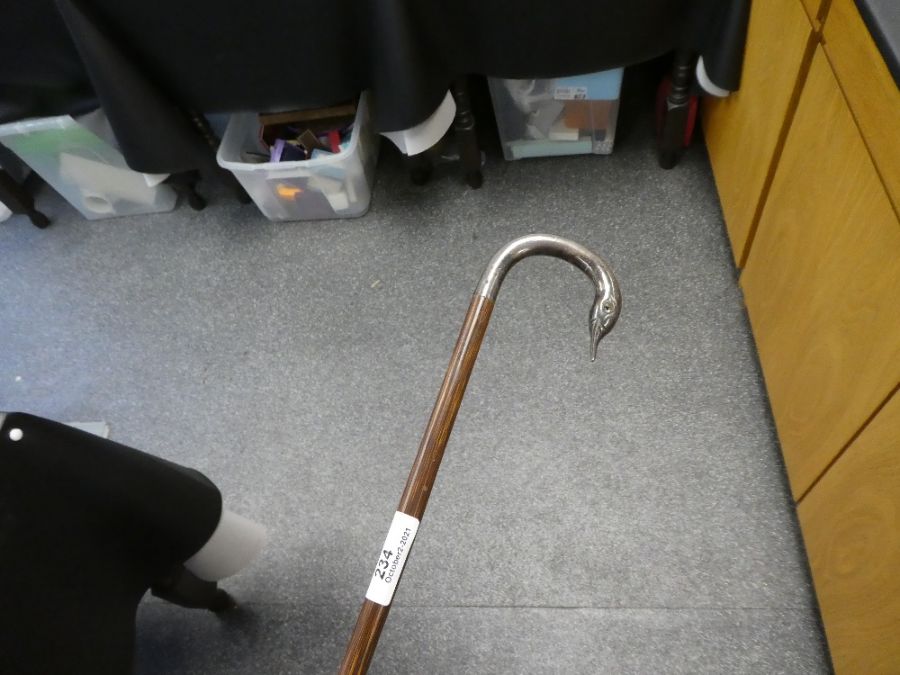 A Victorian cane having silver swan neck handle - Image 3 of 3