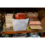 Three boxes of vintage Ordnance Survey maps from the 1920s onwards and cigarette cards