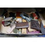 Box of collectables including vintage stationery, darts, geometry sets, etc