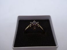 Pretty 9ct yellow gold garnet cluster ring, size O, marked 375, 1.2g approx
