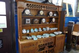 A French style pine dresser and rackback having pierced decoration (one drawer missing). Vintage.