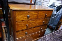 A Victorian mahogany chest having two short and three long drawers