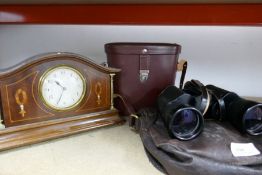 A pair of Carl Zeiss 10 x 50 wide binoculars and an 8-day French wooden mantle clock