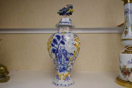 An old French Quimper style vase with cover, decorated figures and bird 43cm