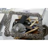A Victorian silver photo frame, pens and sundry