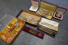 A large quantity of good quality costume jewellery including brooches, pearls, necklace watches, etc