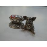 A silver novelty pig sitting down, a nice heavy and high quality item hallmarked London 2000 possibl