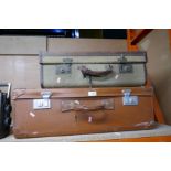 Two vintage suitcases one being canvas and leather bound