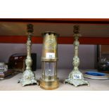 Brass miners lamp 'E Thomas and Williams' Cambrian 82251, and a pair of brass candlesticks