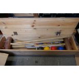 A modern croquet set in wooden case