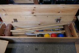 A modern croquet set in wooden case