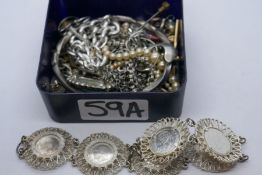 A collection of silver costume jewellery to include a curb link bracelet with heart shaped padlock,