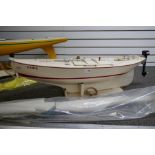 Remote Control model Yacht, built 1934, complete with stand, sail and internal workings (no controll