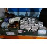 Two trays of sundry including commemorative mugs