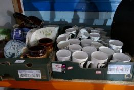 Two trays of sundry including commemorative mugs