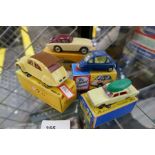 Four dinky, Corgi and Matchbox vehicles (some repro boxes)