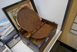 An antique Symphonion musical box with 5 7.5 inch discs