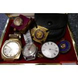 A small box containing Masonic medals, vintage wristwatches, coins, etc