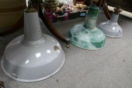 Three enameled industrial ceiling lights, one by Benjamin