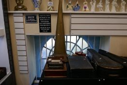 An antique Coquet phonograph with brass horn and sundry cylinders