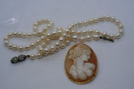 WIHDRAWN 18ct yellow gold mounted cameo brooch pendant, marked 4 x 3cm and a string of pearls