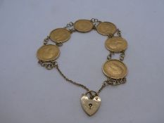 9ct yellow gold bracelet each link being a Georgian half Sovereign, six in total, all Young George,