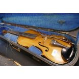 An antique Lion head violin probably from the Dresden region with 14 inch back