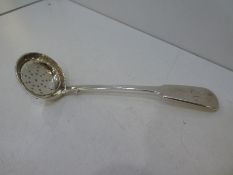 An Irish Georgian silver high quality tea strainer. Heavy weight with engraved EA initials. Hallmark