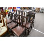 A set of 6 early 20th century mahogany dining chairs including a pair of carvers