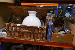 Wicker hampers containing glass and China. A box of model cars and a box of sundry including a camer