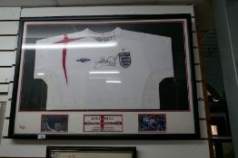 Framed and glazed Steven Gerrard England shirt and a signed framed and glazed poster 'Gazza'