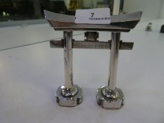 A possibly Chinese watch stand marked XMAS 1906 with mark on the base. White metal 4.59ozt total app