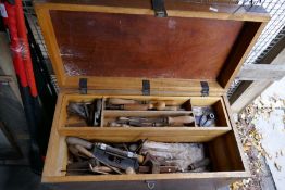 Vintage ironbound tool chest containing vintage tools