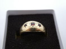 9ct yellow gold garnet set gypsy ring, size N, marked 375, 2.3g approx.